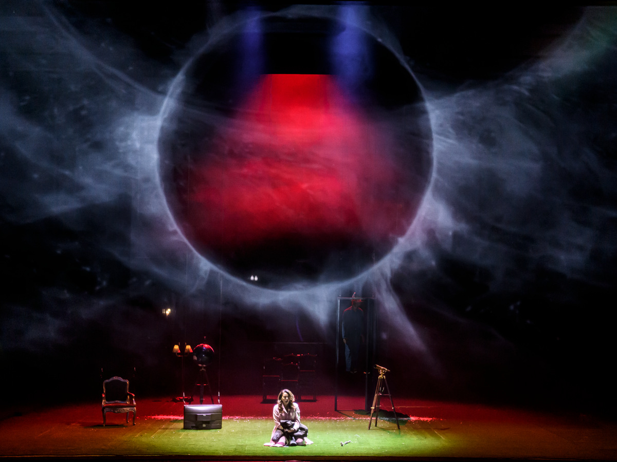 Rihab Chaieb as Claire beneath the looming planet in Melancholia at the Royal Swedish Opera, 2023. Photo by Sören Vilks.
